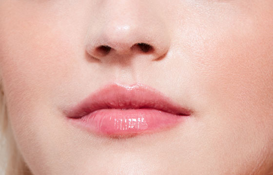 Makeup used for the chic natural look lips: Le Brillant Gloss Ultra Gisèle